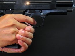 A close up shot of the Beretta M92 being held