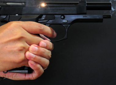 A close up shot of the Beretta M92 being held