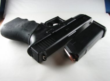 Glock 19 with a magazine and ammo