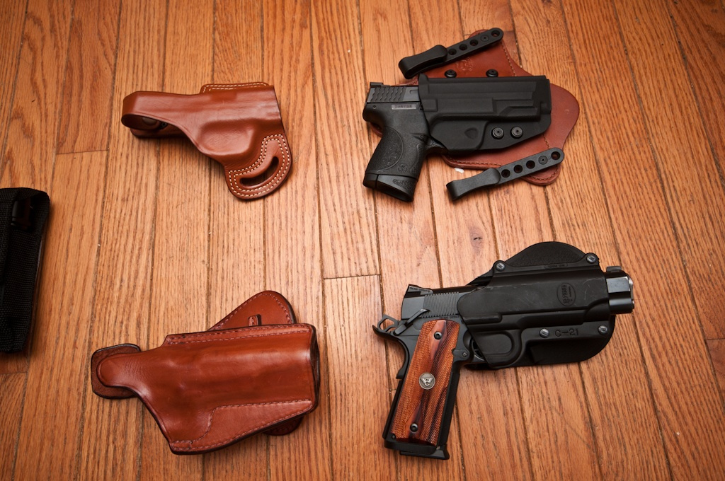 Leather Paddle Holsters and guns