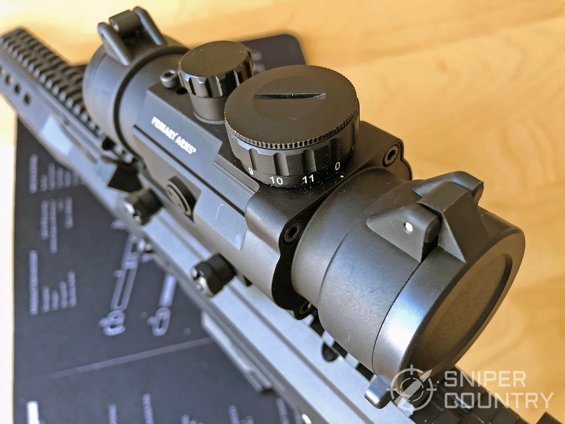 Primary Arms 2.5x close-up with closed covers