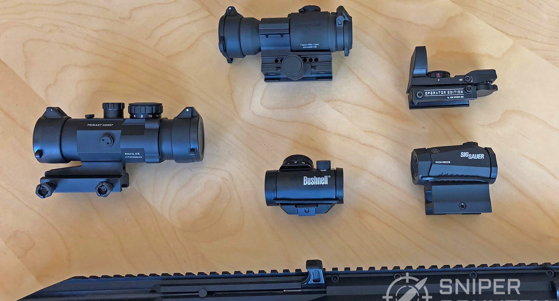 Selection of red dot sights and 9mm carbine