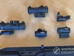 Selection of red dot sights and 9mm carbine