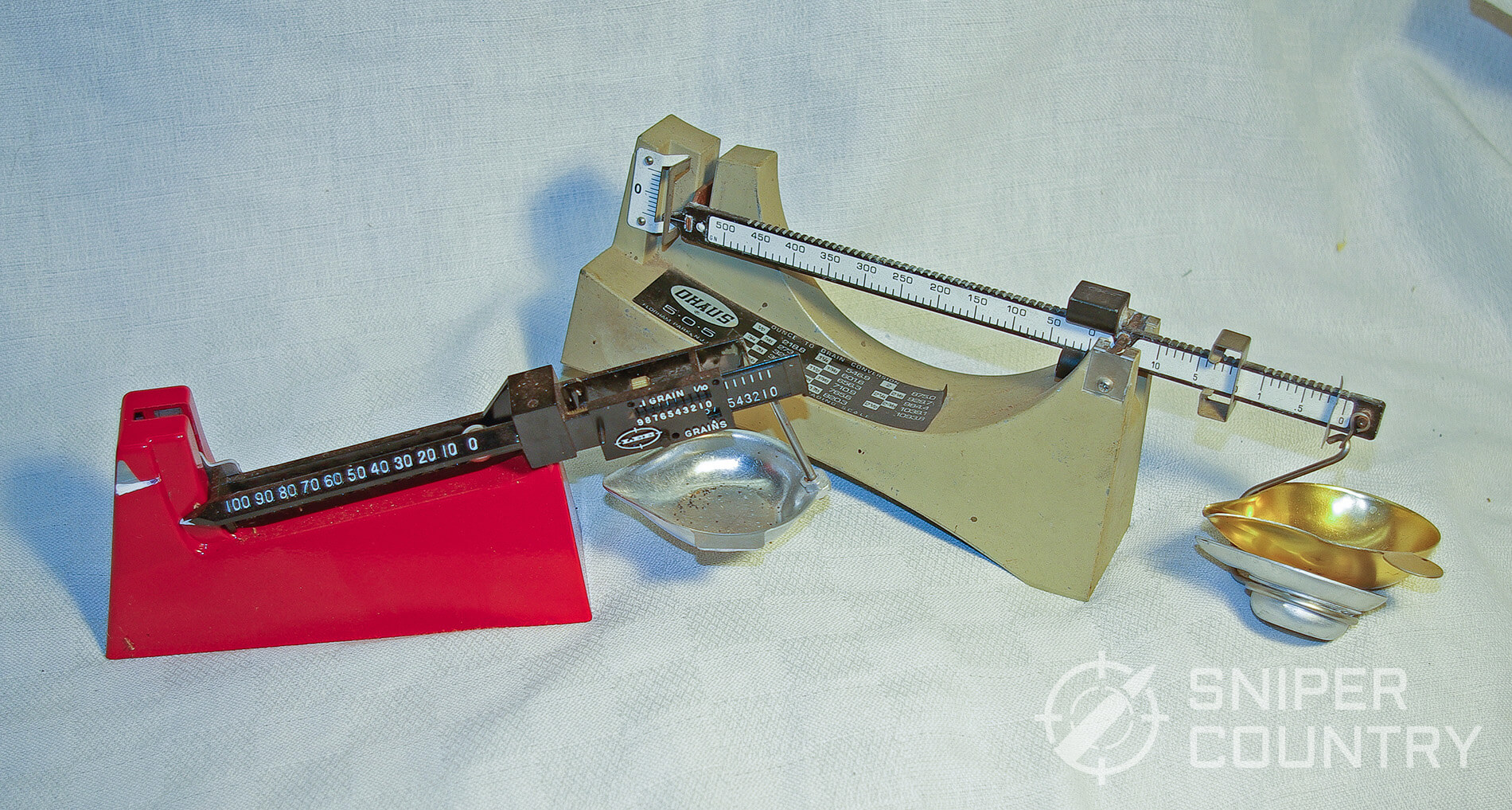 Two balance beam scales