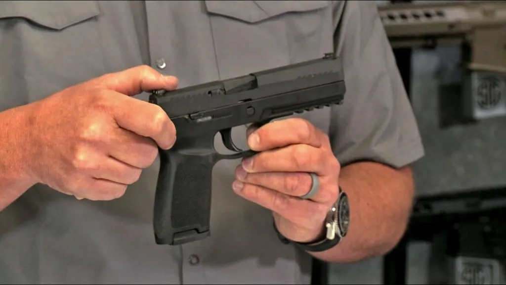 Sig P320 Nitron in hand
