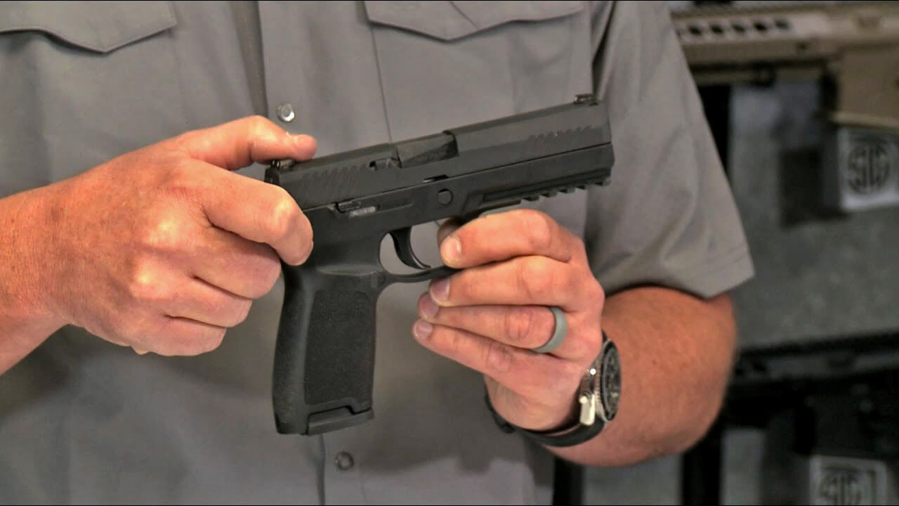 Sig P320 Nitron in hand
