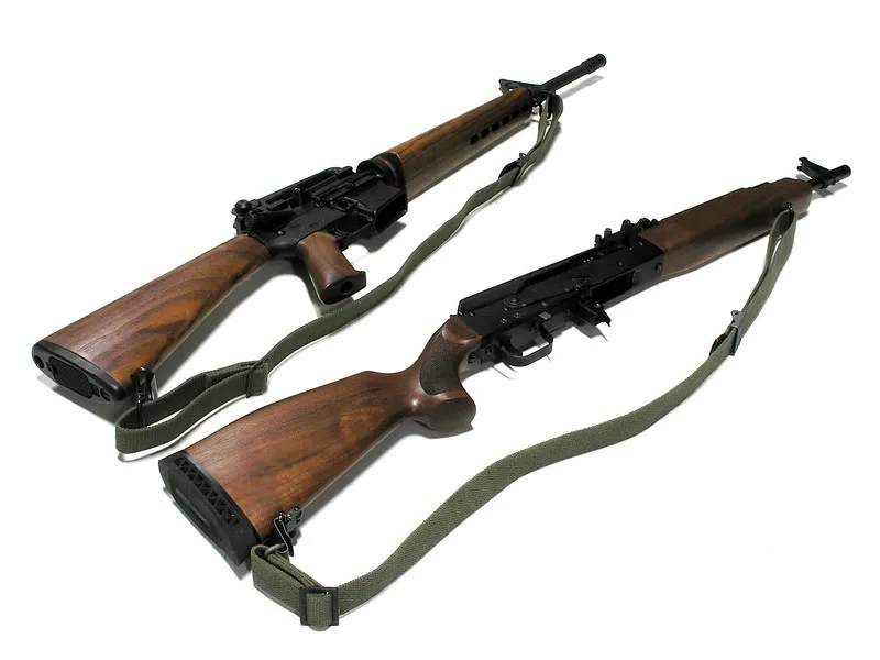 Best AR 15 Slings Nylon sling on walnut stock assault rifles