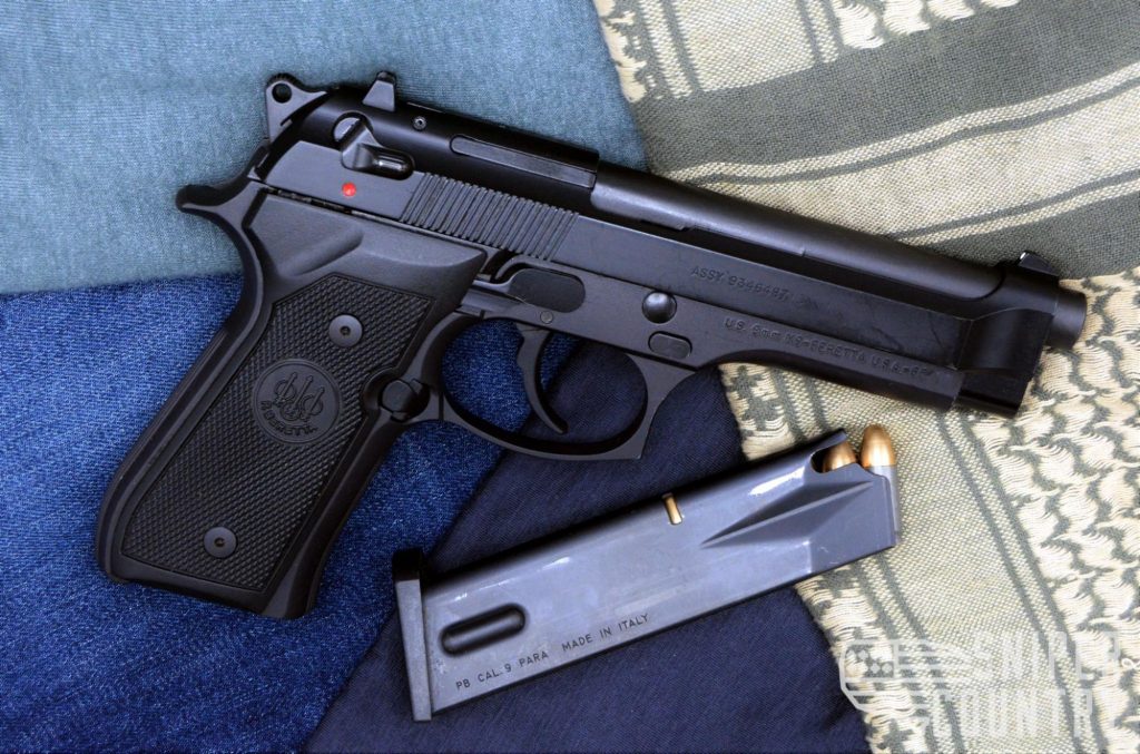 standard version of the Beretta M9 with full load mag