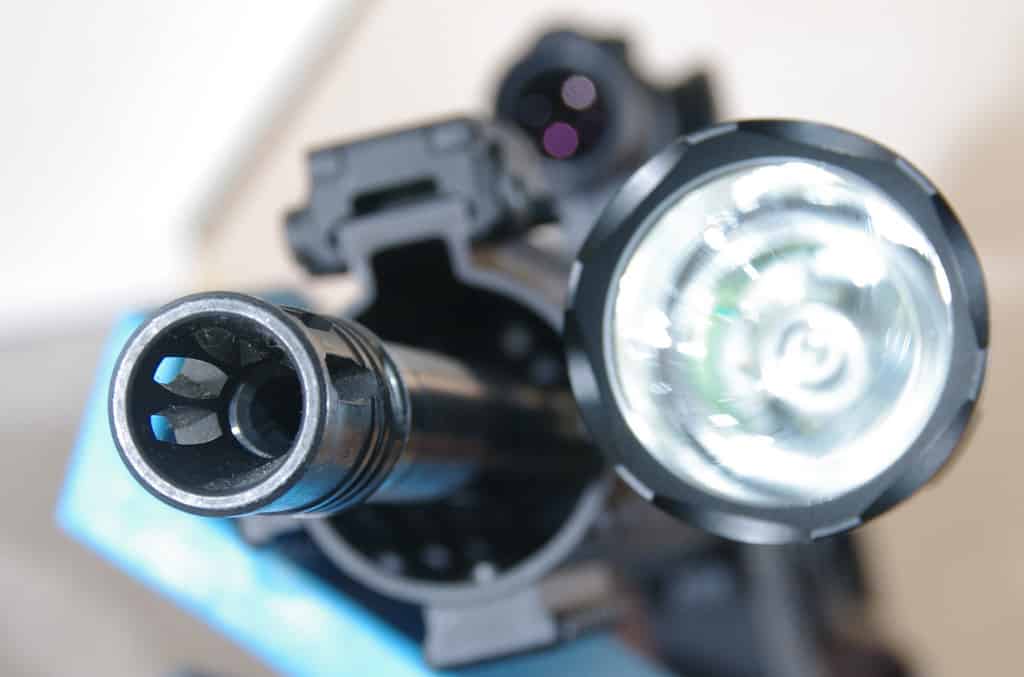 A flashlight installed on an AR-15
