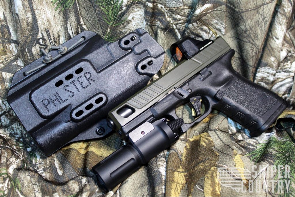 Best Glock Glock 19 Holosun 407K green dot, Modlite PL350 light, and Tyrant CNC trigger shoe with an Apex trigger kit