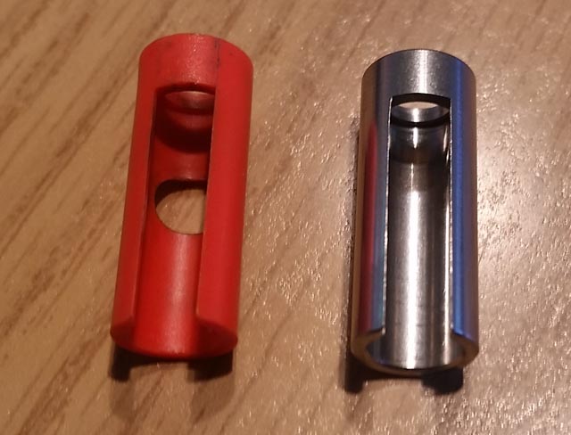 Plastic (left) and Stainless Steel (right) Striker Guide for the Taurus G2C
