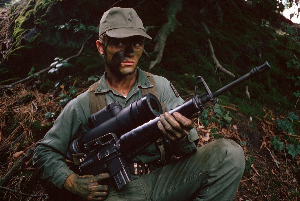 Vietnam War-era soldier with an M16A1 rifle and an AN/PVS-2