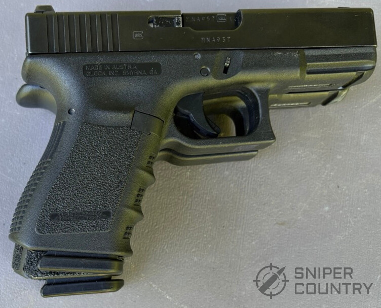 Glock 19 on top of a Glock 45 showing the size difference.