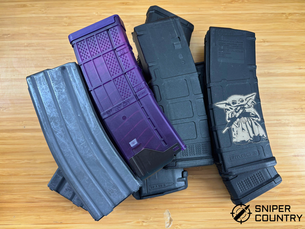 assorted pile of ar15 magazines