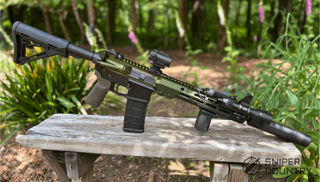 Geissele 11.5 ar15 with red dot sight and silencer