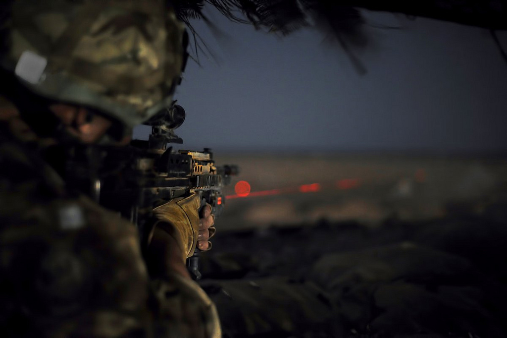 Soldier Aiming with Laser Light Module by Defence Images best laser light combo
